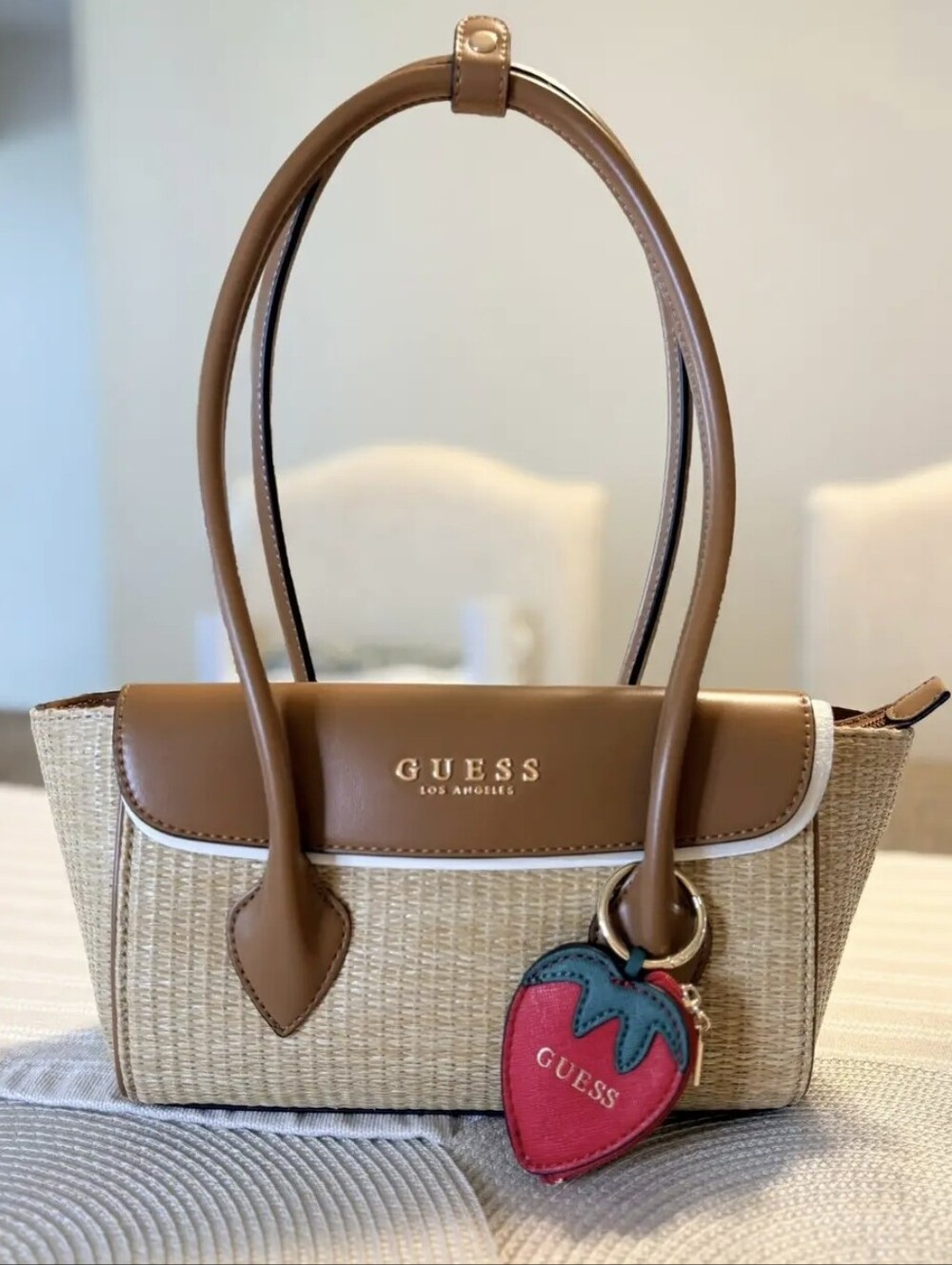 GUESS Tan Straw Tote with Red Strawberry Charm